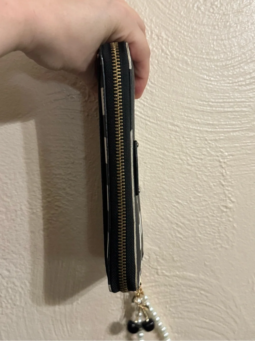 kate spade Black and White Check Zip-Around Wristlet with Pearl Strap